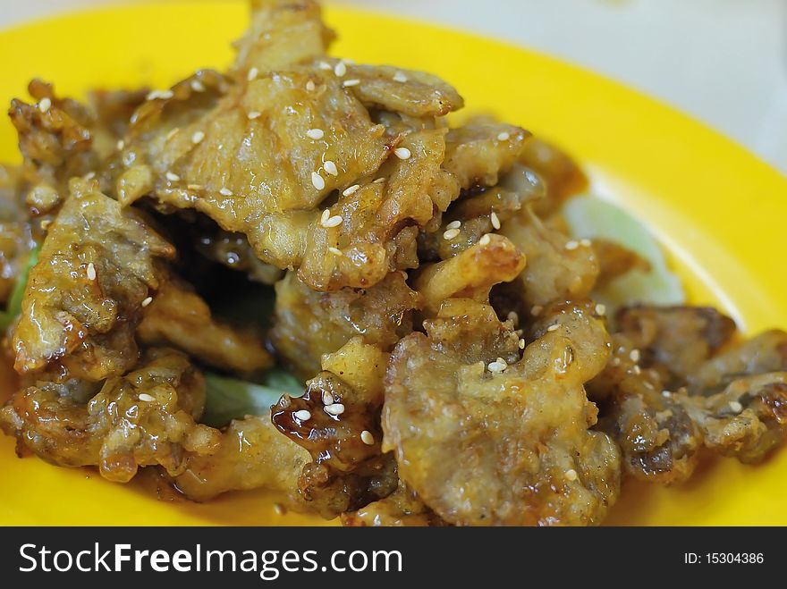 Deep fried mushroom delicacy made from abalone mushrooms. Concepts such as food and beverage, and travel and cuisine, and diet and nutrition.