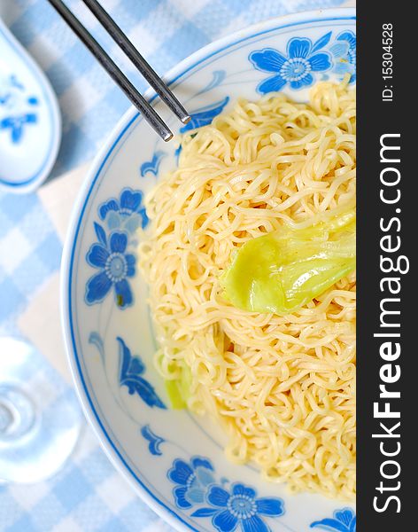 Oriental yellow noodles. For concepts such as diet and slimming, healthy lifestyle, and food and beverage. Oriental yellow noodles. For concepts such as diet and slimming, healthy lifestyle, and food and beverage.