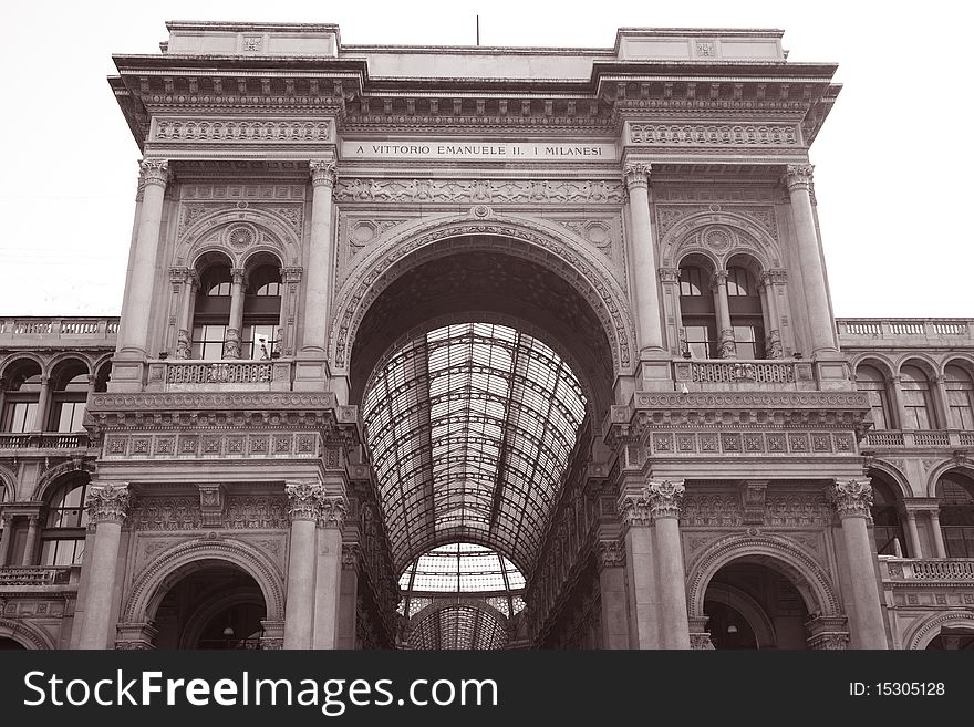 Entrance to Vittorio Emanuele II Shopping Gallery in Milan, Italy in Sepia. Entrance to Vittorio Emanuele II Shopping Gallery in Milan, Italy in Sepia