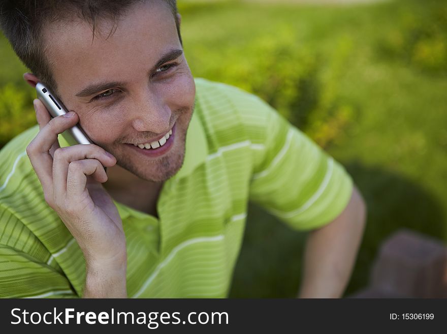 Cheerful guy in a green vest.