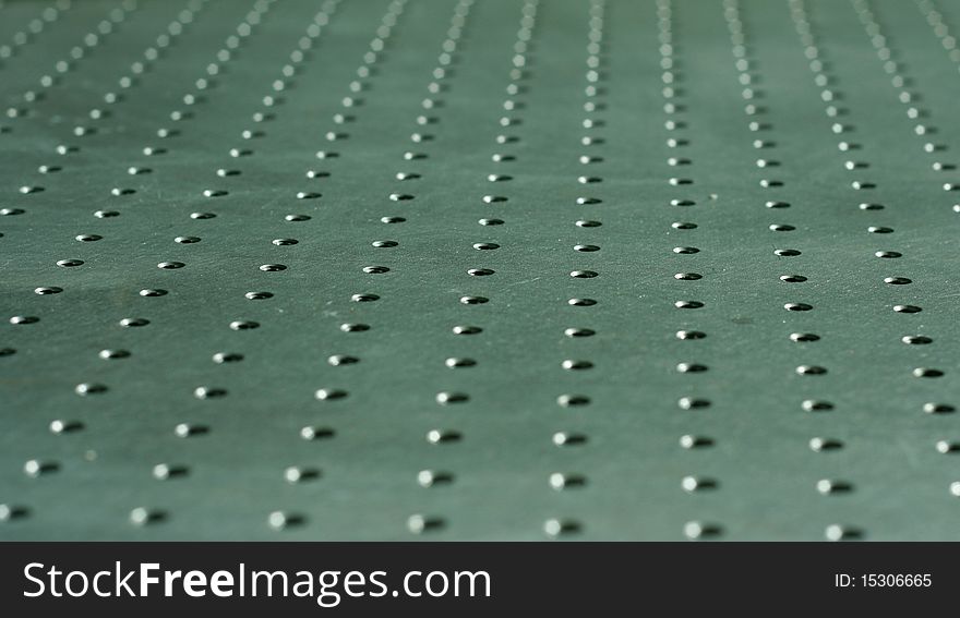 Gray metallic table with special holes for the attachement of research electronic devices. Gray metallic table with special holes for the attachement of research electronic devices