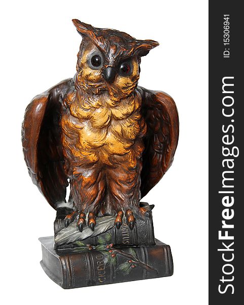 Owl statue symbolizing the learning with books.