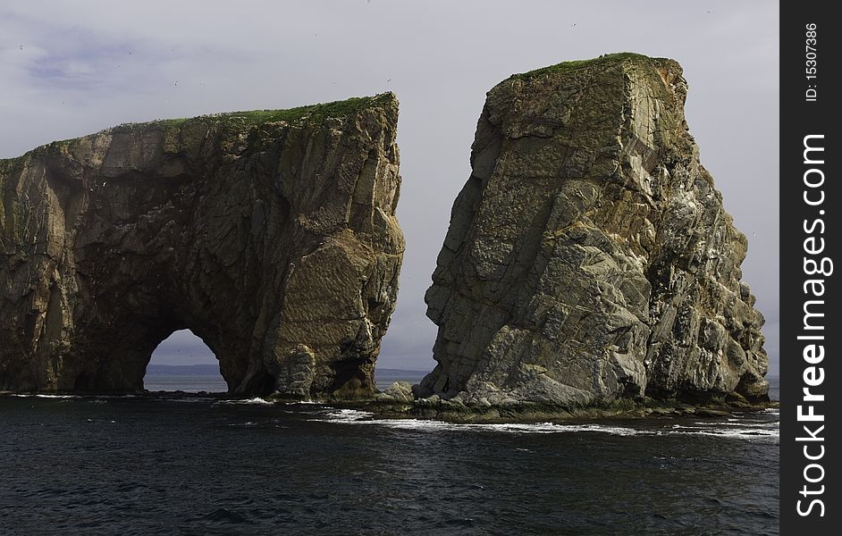 Pierce Rock in Gaspe Quebec as seen from the water