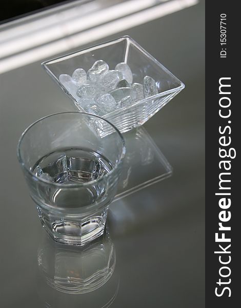 Glass of fresh drinking water, vertical composition. Glass of fresh drinking water, vertical composition