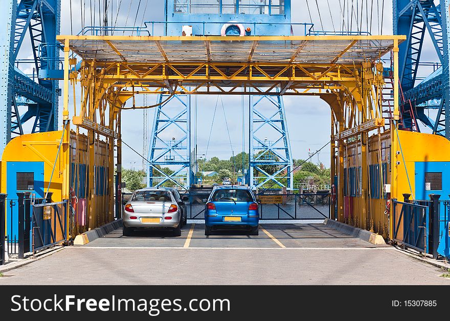 The unique bridge connects Middlesbrough on the south bank of the River to Port Clarence on the north bank. It is a transporter bridge, carrying a moving cradle or gondola suspended from the bridge, across the river in 90 seconds. The carriage can carry 200 people, 9 cars or 6 cars and one minibus. The unique bridge connects Middlesbrough on the south bank of the River to Port Clarence on the north bank. It is a transporter bridge, carrying a moving cradle or gondola suspended from the bridge, across the river in 90 seconds. The carriage can carry 200 people, 9 cars or 6 cars and one minibus.