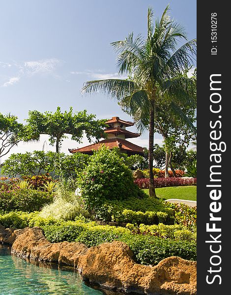 Tropical garden with a pond, Bali island, Indonesia. Tropical garden with a pond, Bali island, Indonesia.