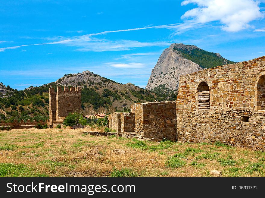Genoese fortress in Sudak, Crimea, Ukraine. Wall and tower view