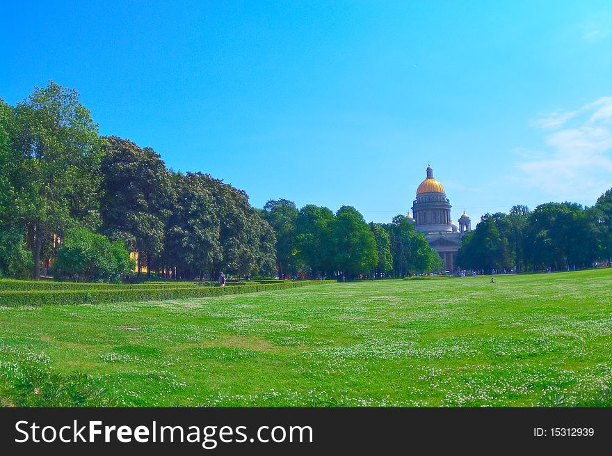 The majestic building of St. Isaac's Cathedral. Kind of the park. St. Petersburg.