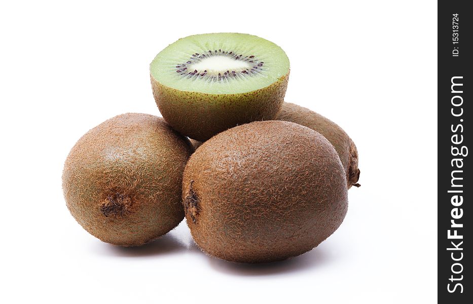Stack of fresh kiwi fruit on white background, closeup