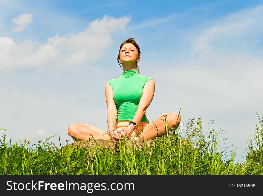 Young woman in meditation pose. Young woman in meditation pose