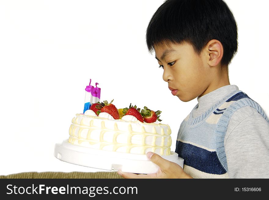Young boy holding birthday cake. Young boy holding birthday cake