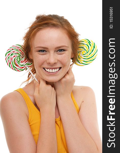 Young woman with lollypop on white