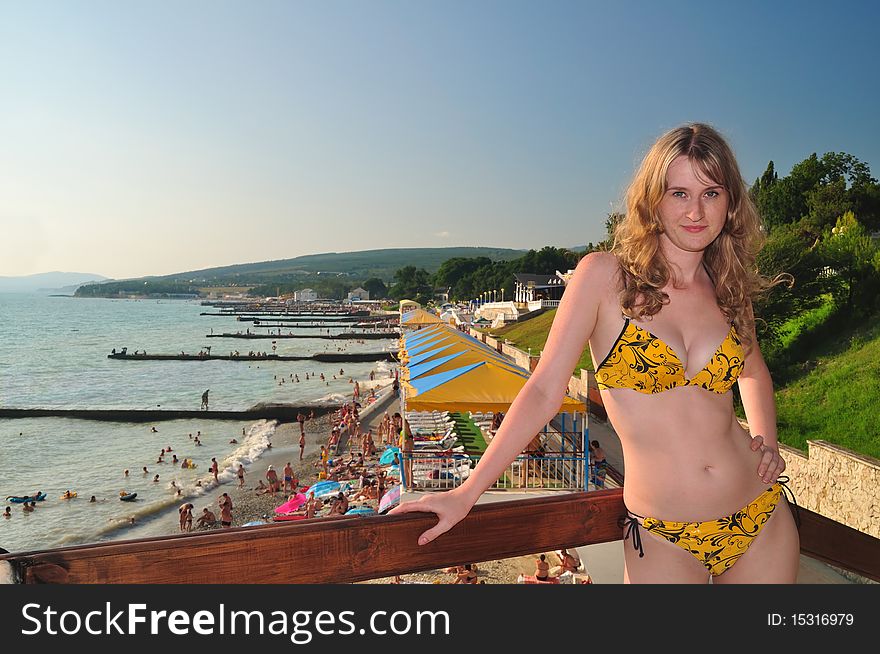 The beautiful girl against the Black Sea beach. Divnomorsky. The beautiful girl against the Black Sea beach. Divnomorsky