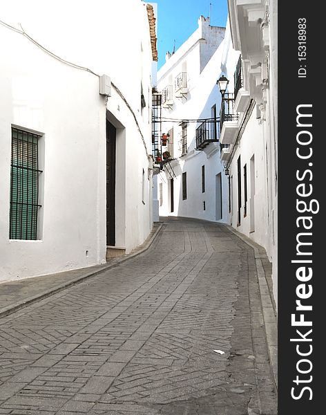 This is a typical street of Vejer de la Frontera, so called, white village, in Andalusia, the south of Spain. This is a typical street of Vejer de la Frontera, so called, white village, in Andalusia, the south of Spain.