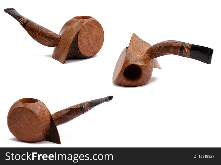 Some tobacco pipes isolated on white background