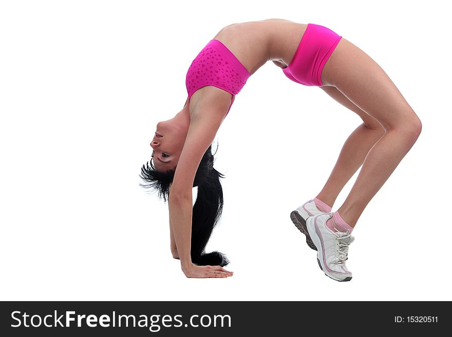 Attractive brunete girl doing gymnastic excersises