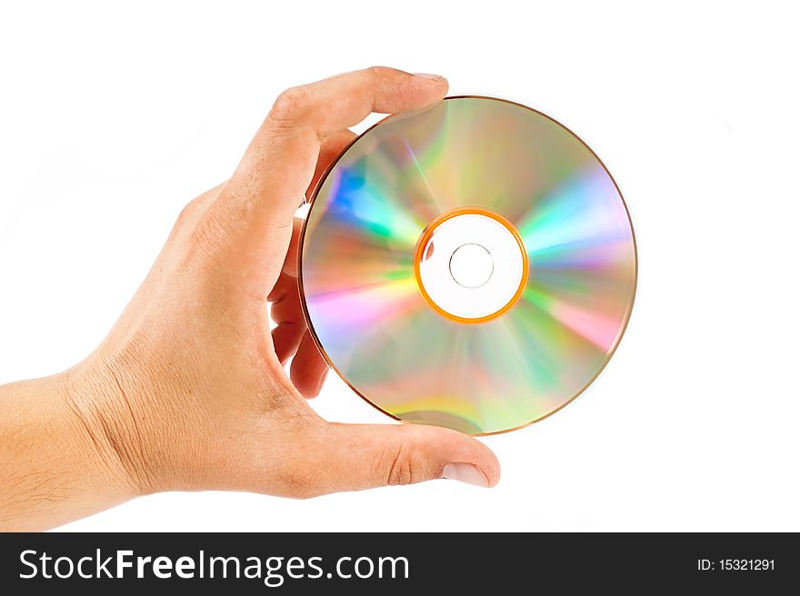 Human hand keeps a CD isolated on white