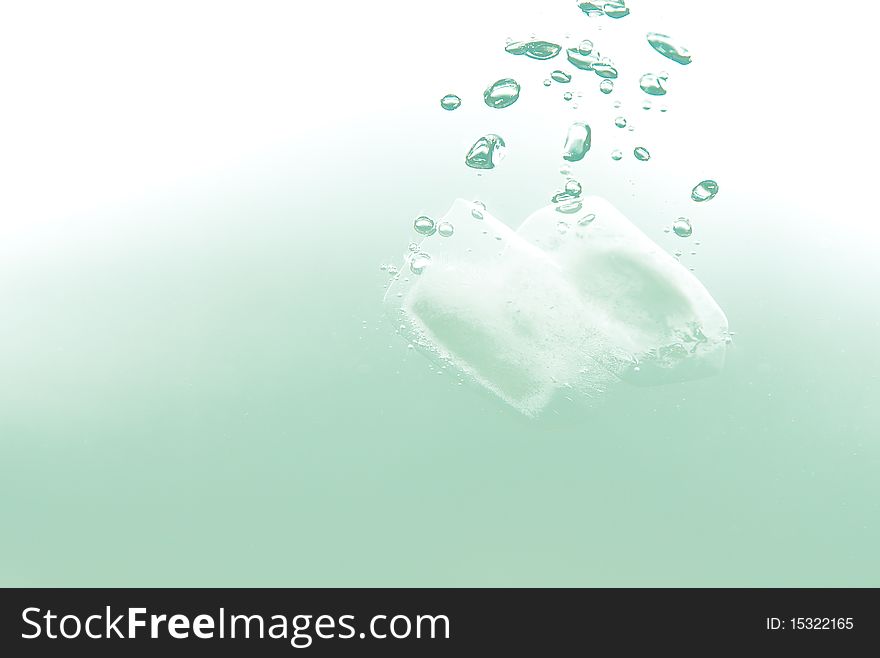 An ice cube splashing in water. An ice cube splashing in water