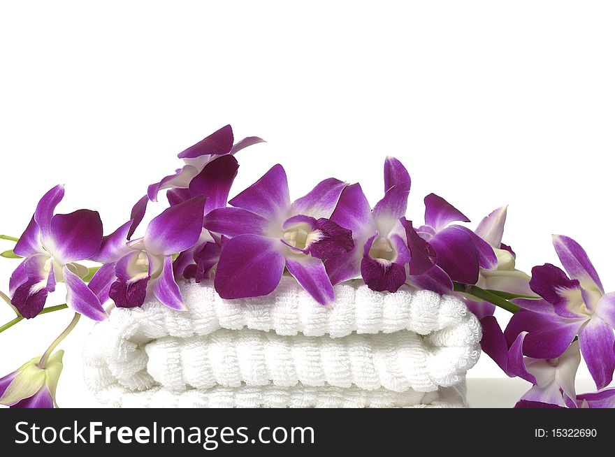 Branch orchid on a white towel. Branch orchid on a white towel