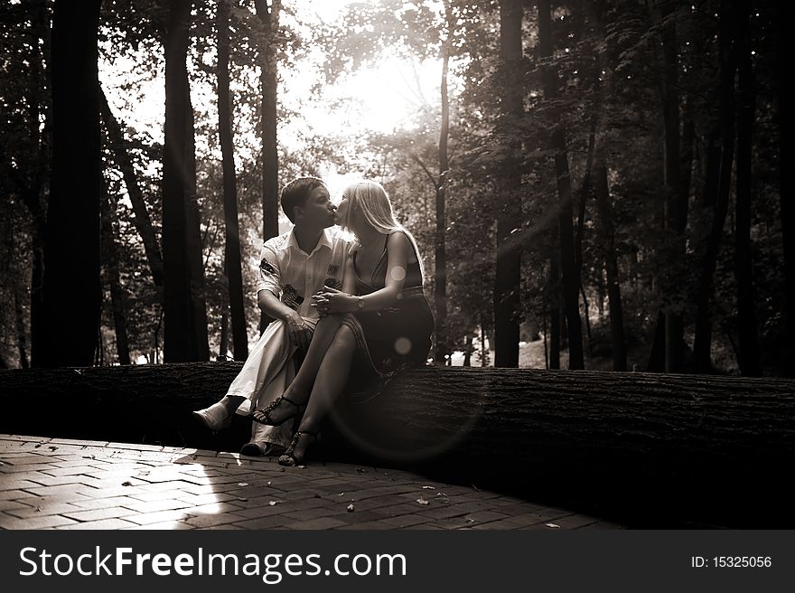 Young couple kissing in the park