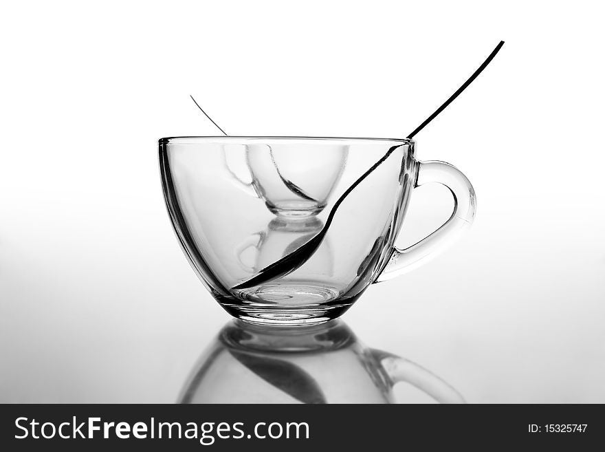 2 glass tea cups with reflection on white at 10Mps. 2 glass tea cups with reflection on white at 10Mps
