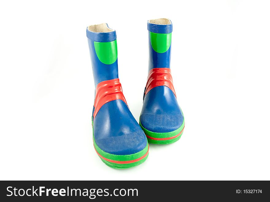 Studio shot of the childs blue rubber boots