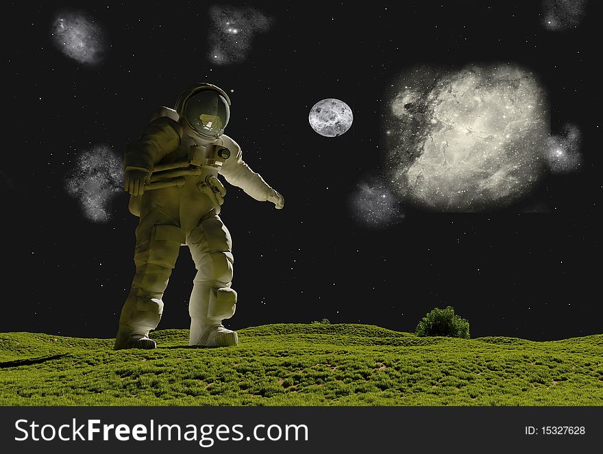 Astronaut on the grass against the sky