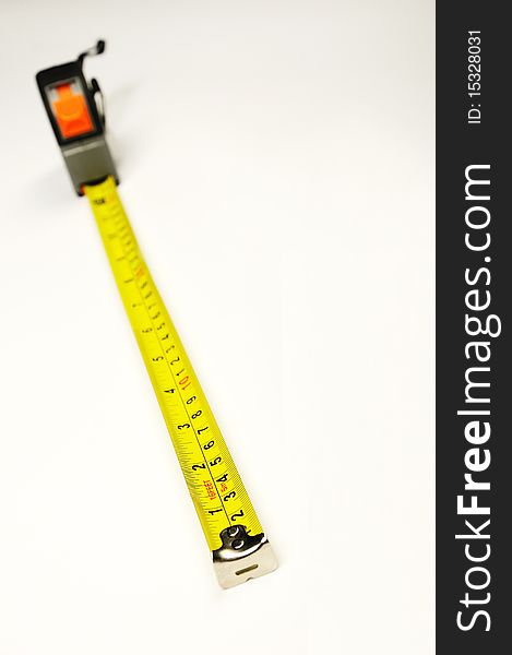 One long yellow tape measure