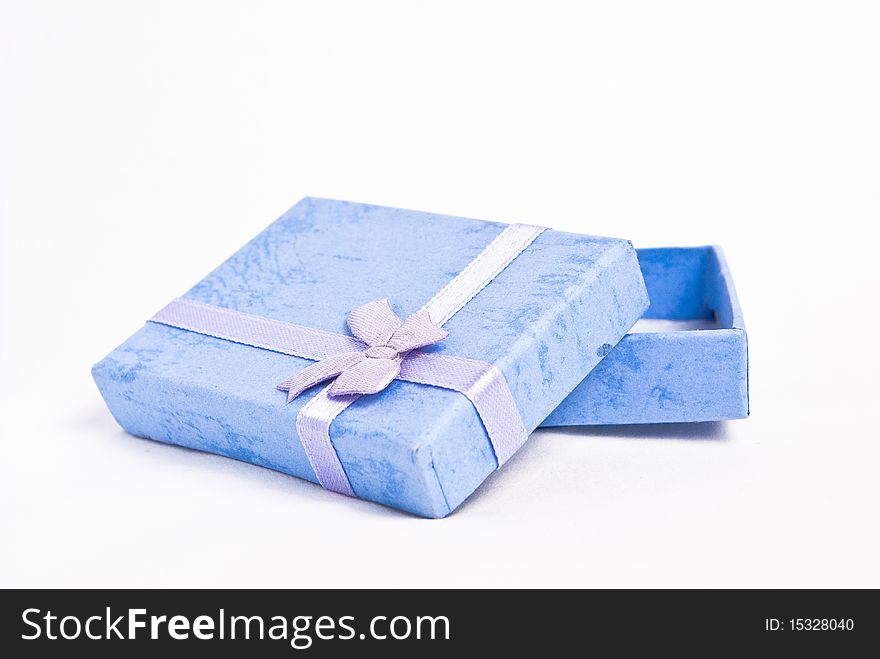 A blue gift box opened on white background