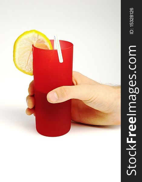 Cold drink in red glass