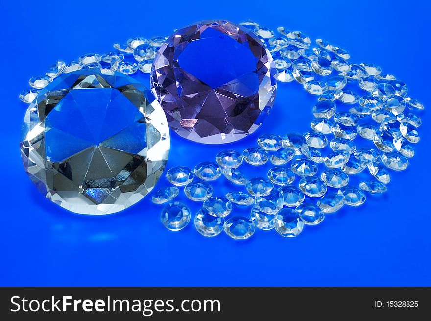 The faceted stones on a dark blue background