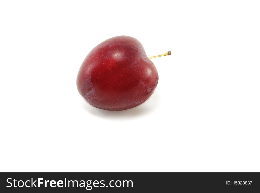 Plum is isolated on a white background. Plum is isolated on a white background