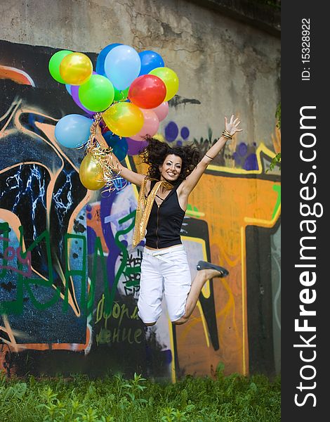 Happy woman with balloons