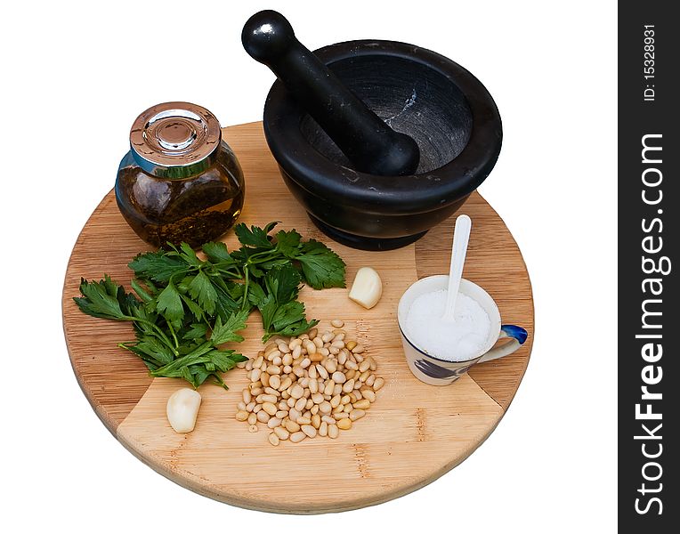 Ingredient for pesto on wooden cutting boaed