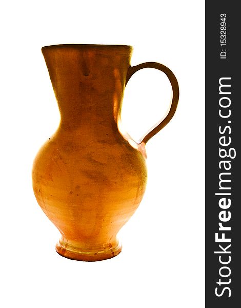 Ancient clay jug in sunlight