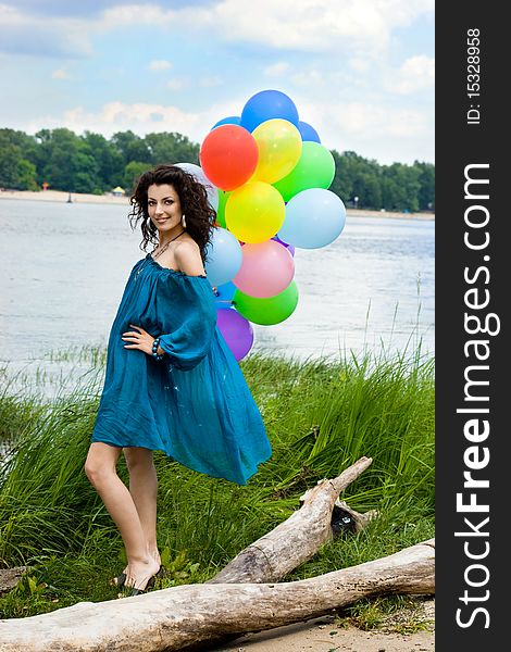 Happy woman with balloons