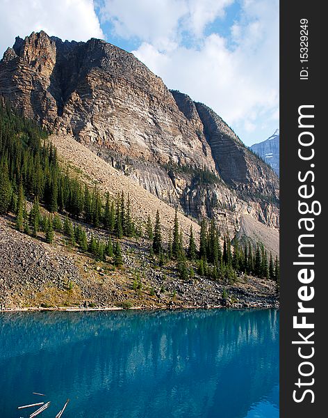 This is Beautiful Moraine Lake in The Canadian Rockies. This glacier lake gets its crystal blue water look from silt on the bottom.