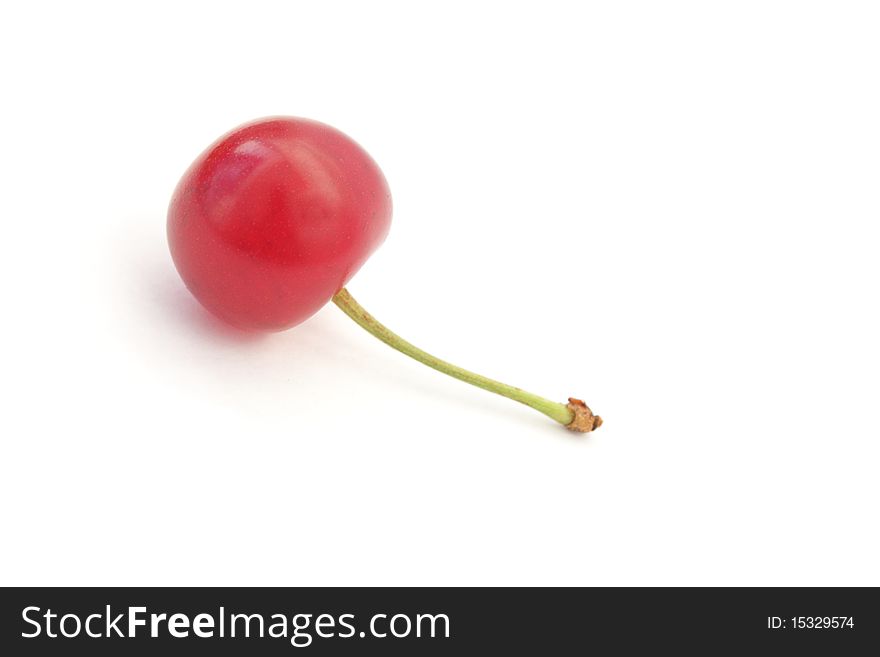 A Single Ripe Cherry Isolated On White