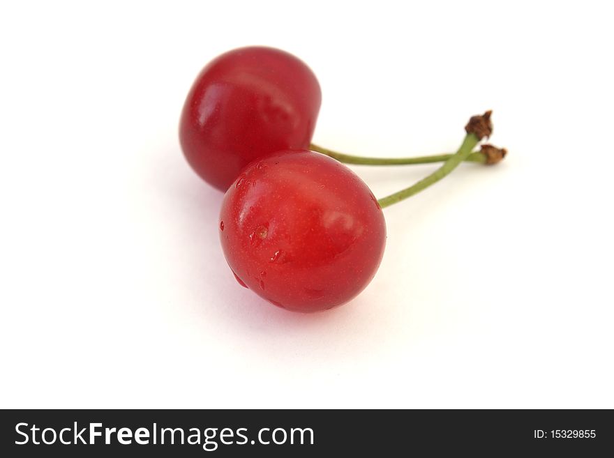 Two Ripe Cherries Isolated On White