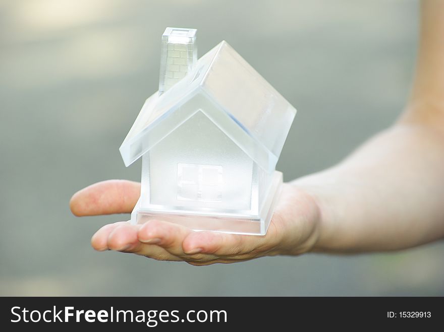 The house in human hand. The house in human hand