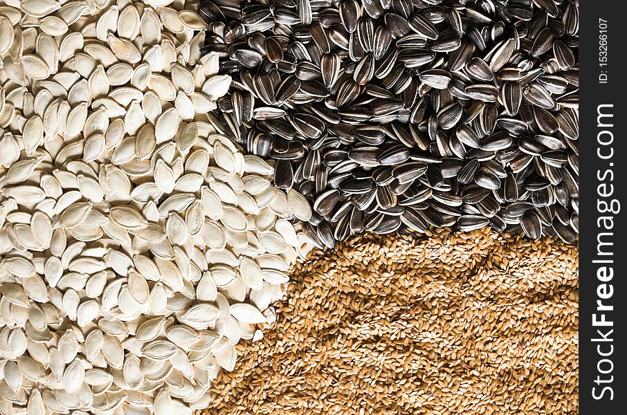 Sesame, sunflower and pumpkin seeds. Healthy eating. Food background