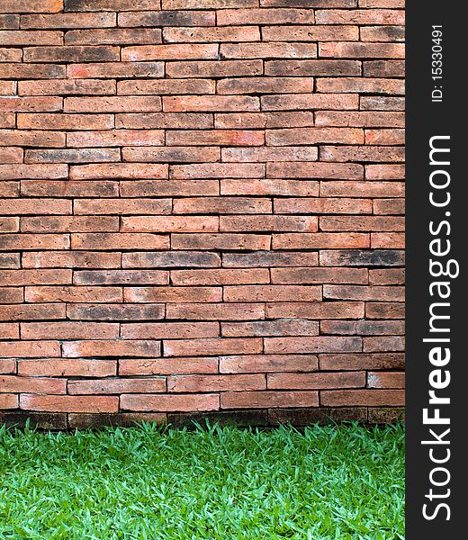 Old Brick Wall and New Green Grass. Old Brick Wall and New Green Grass