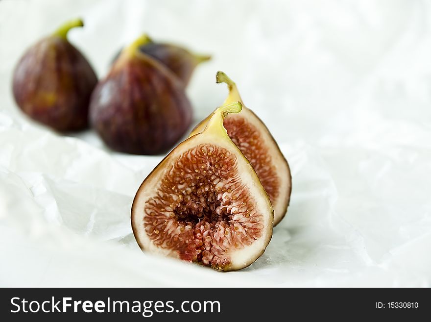Fig fruits on a white paper