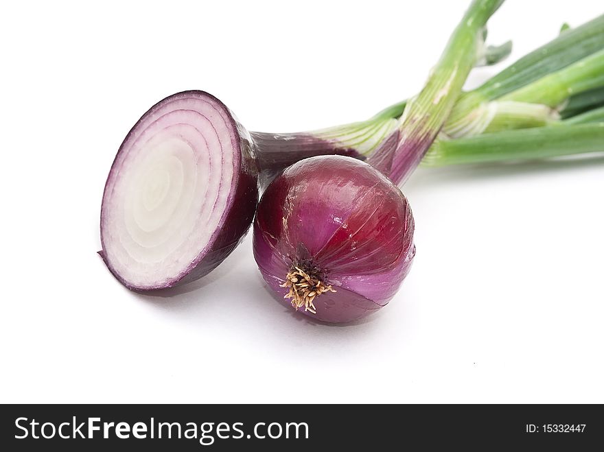 Red young onion on white