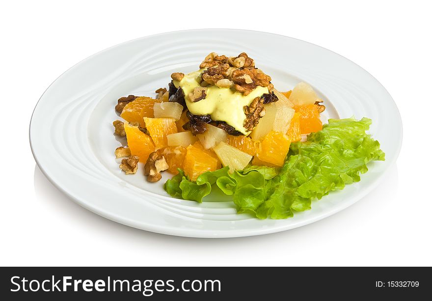 "Spring asylum" salad with fruits, nuts, honey, prunes and cognac.
Isolated on white by clipping path.