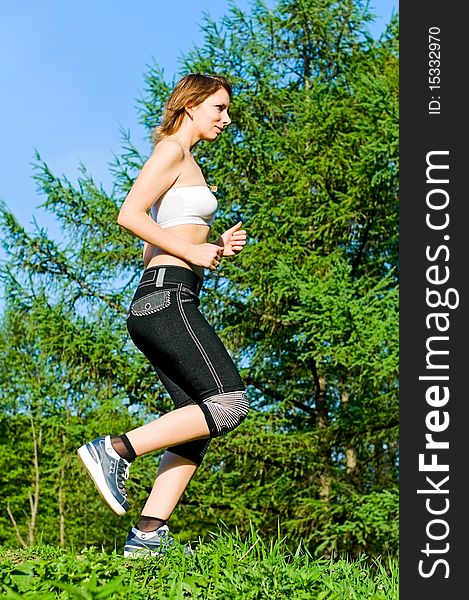 Girl running in forest