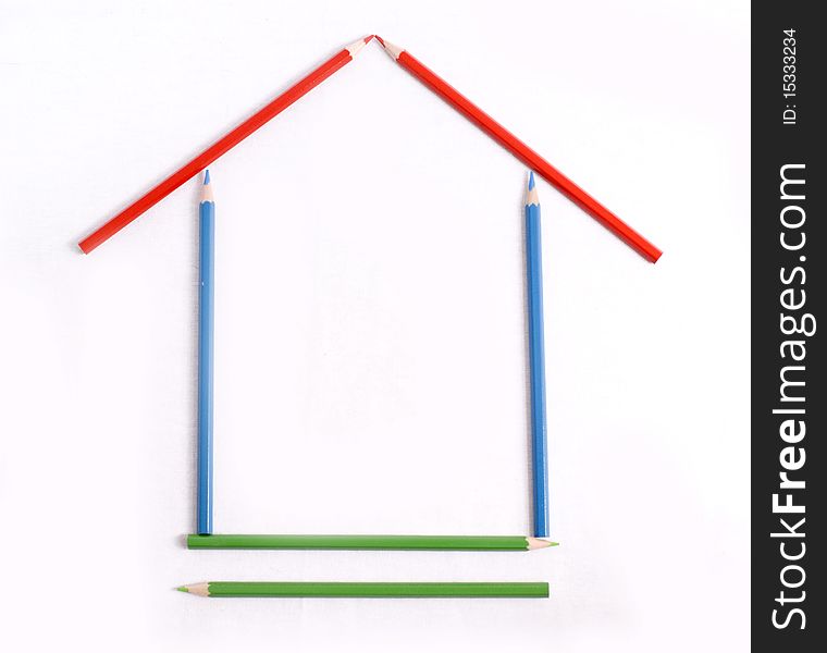 Close up shot of a set of pens forming a house