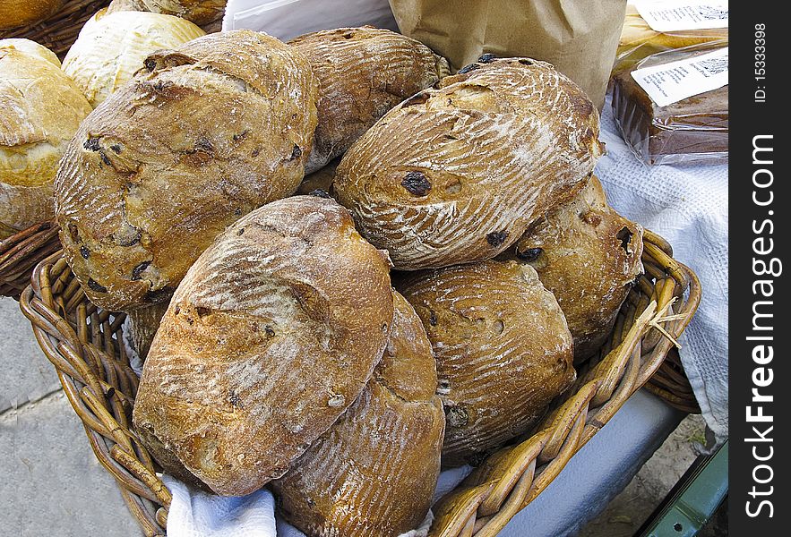 Loaves of Organic Bread for sale at outdoor farmers market. Loaves of Organic Bread for sale at outdoor farmers market