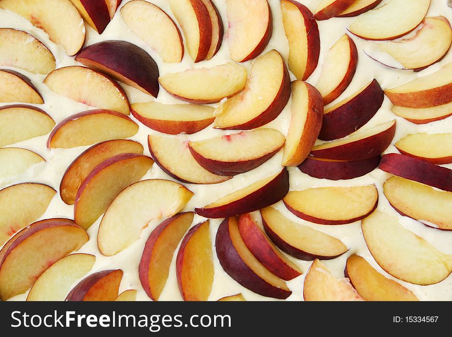 Peach pie prepared for cooking close-up. Peach pie prepared for cooking close-up