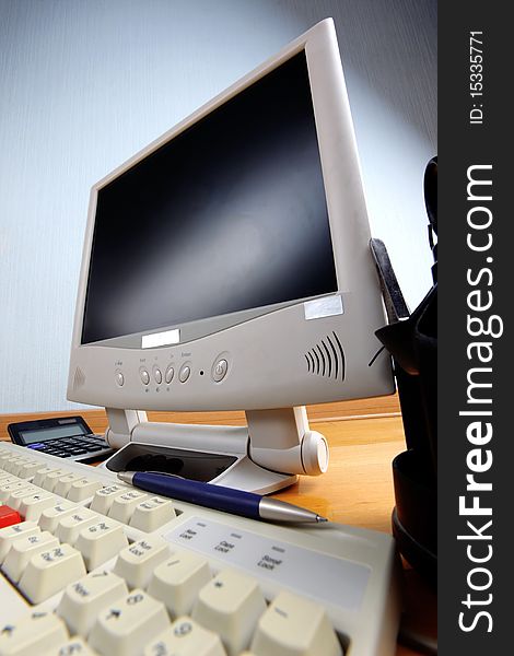 Classic work place - keyboard and monitor at table